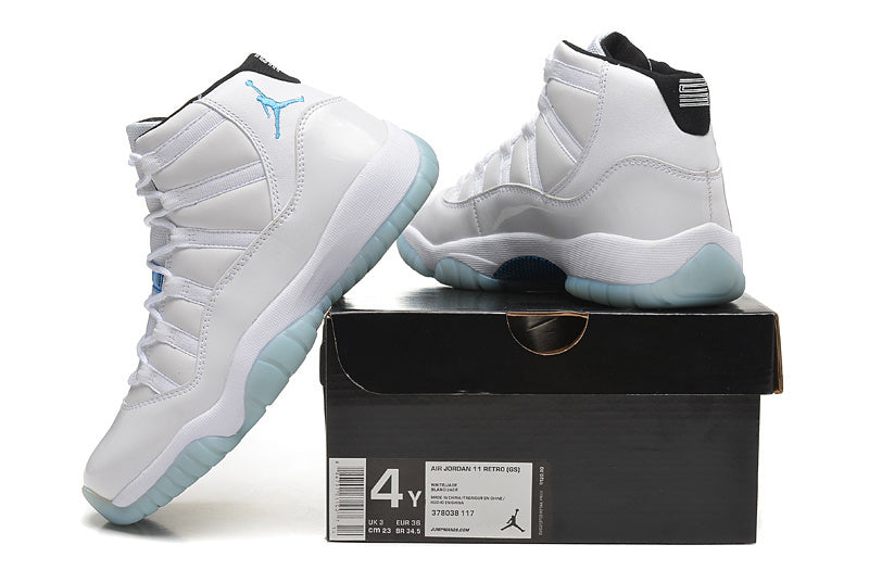 Jordan Air Jordan 11 Retro High-Top Sneakers in White and Blue
