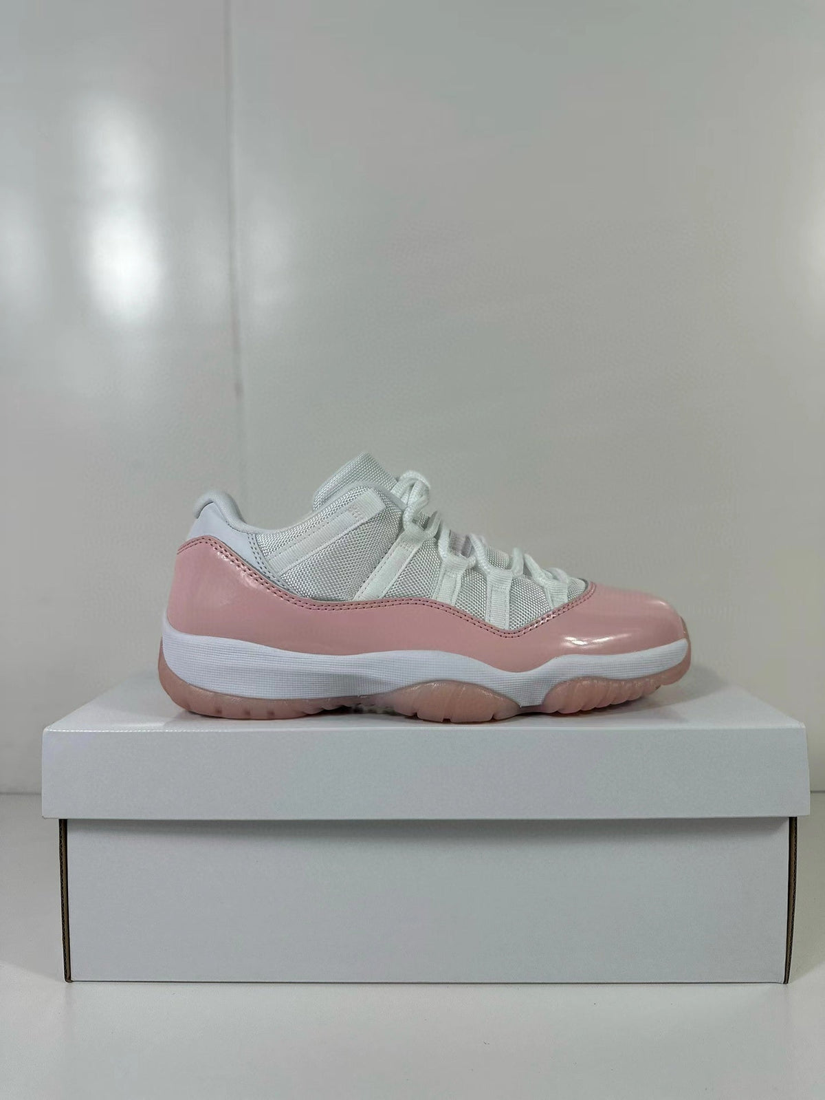 Jordan Air Jordan 11 Low Women’s Pink Sneakers AH7860-160