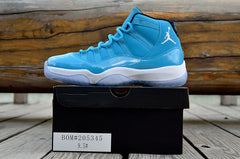 Air Jordan 11 High Sneakers in Blue and White