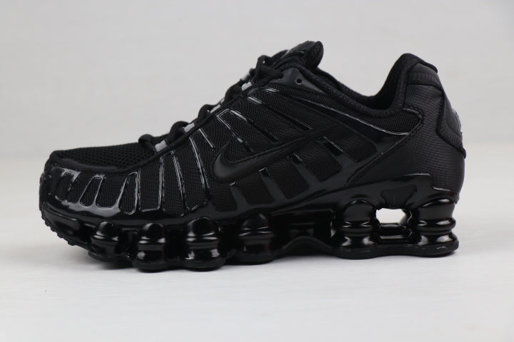 Nike Shox TL Sneakers in Black and Gold