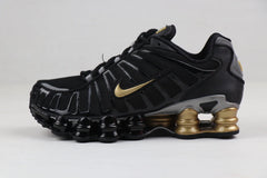Nike Shox TL Sneakers in Black and Gold