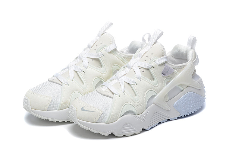 Nike Air Huarache Run Sneakers in White and Pale Blue
