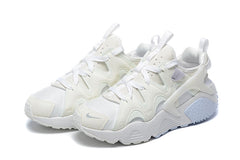 Nike Air Huarache Run Sneakers in White and Pale Blue
