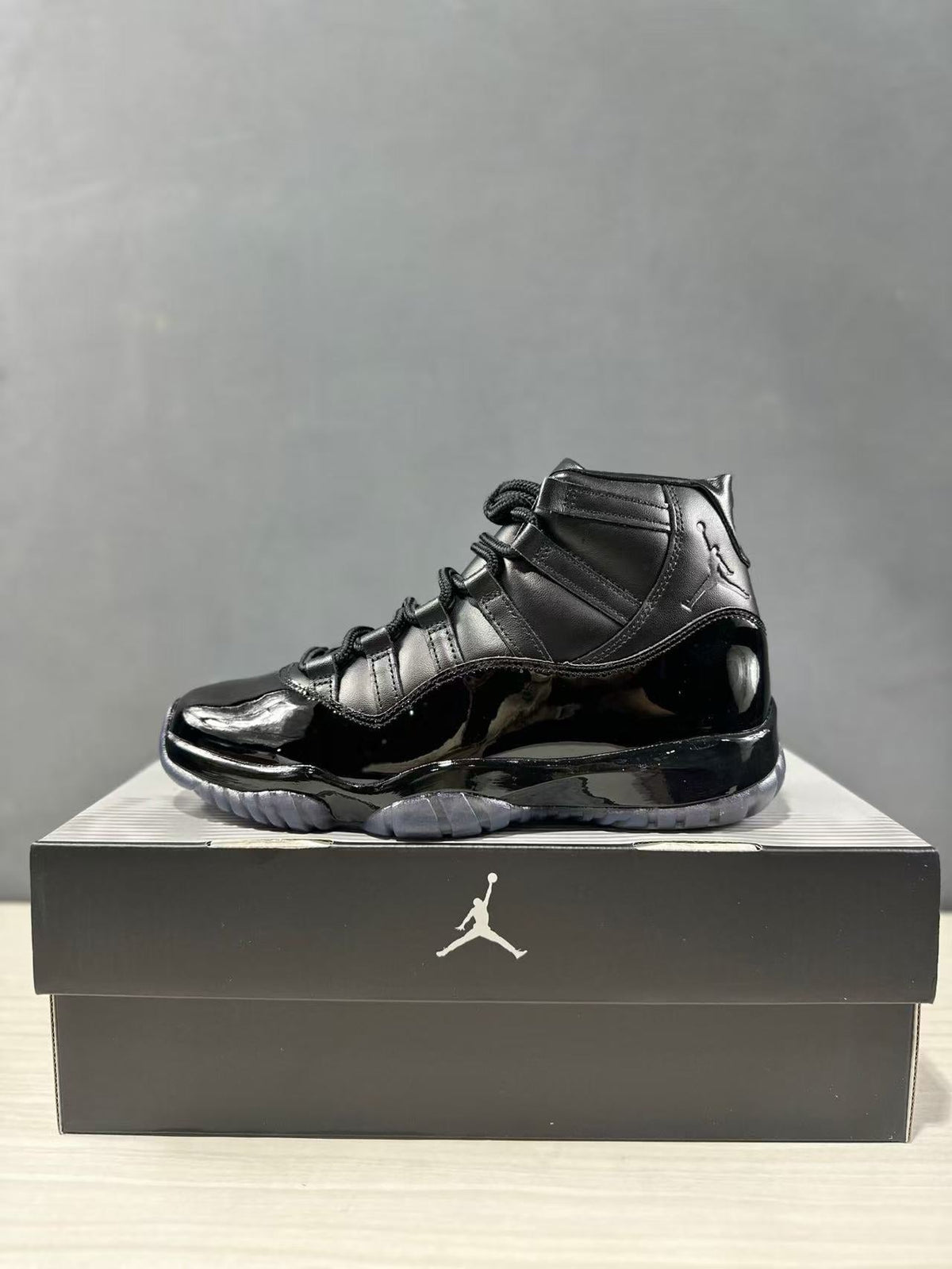 Comme des Garçons × Jordan Air Jordan 11 Black Sneakers