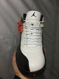 Jordan Air Jordan 12 Retro White and Black High-Top Sneakers