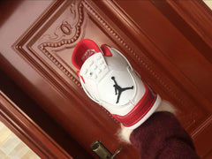Jordan 4 Retro White and Red High-Top Sneakers