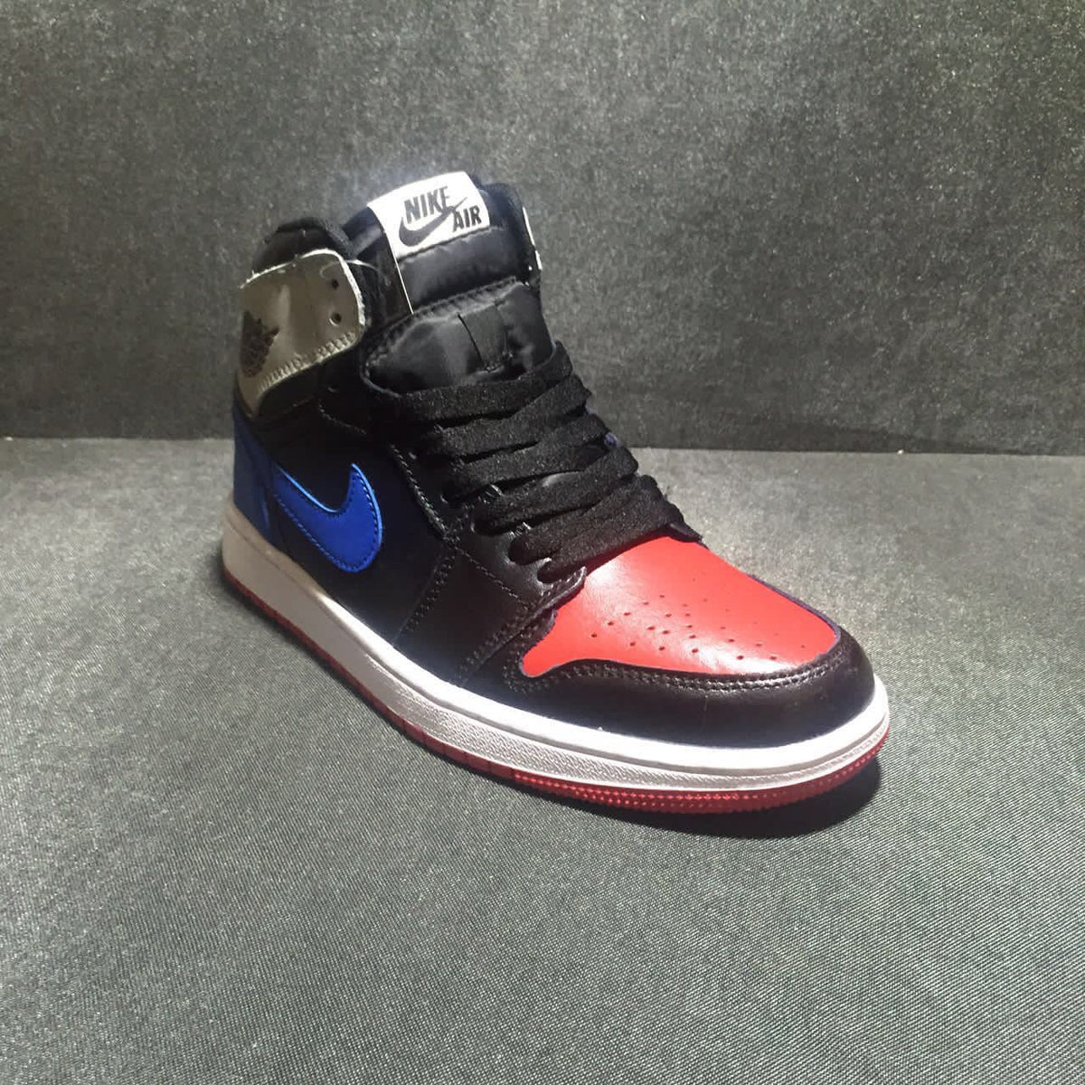Jordan 1 High Three-Color Sneaker in Black, Blue and Red
