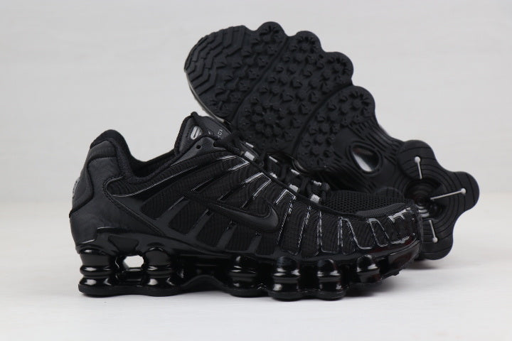 Nike Shox TL Sneakers in Black and Gold