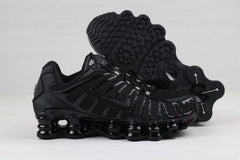Nike Shox TL Sneakers in Black and Gold