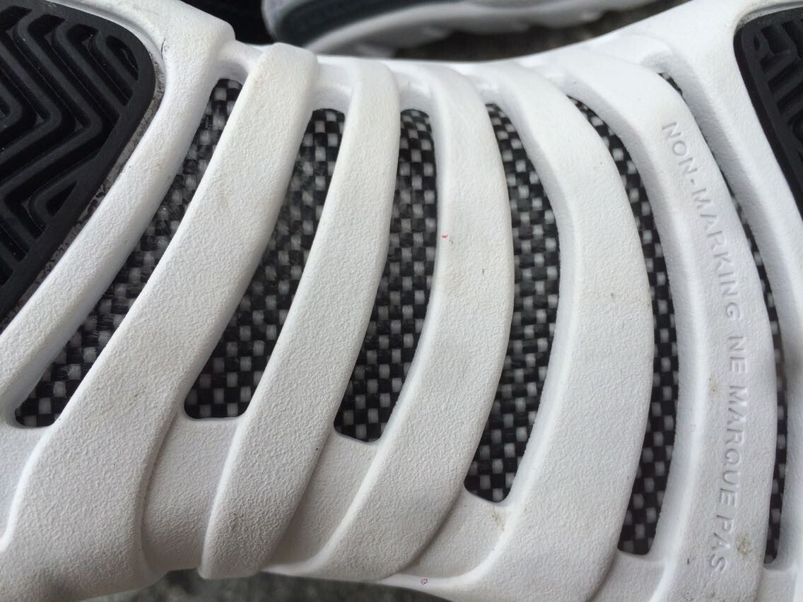 Air Jordan 12 Women's High-Top Sneakers, Black and White