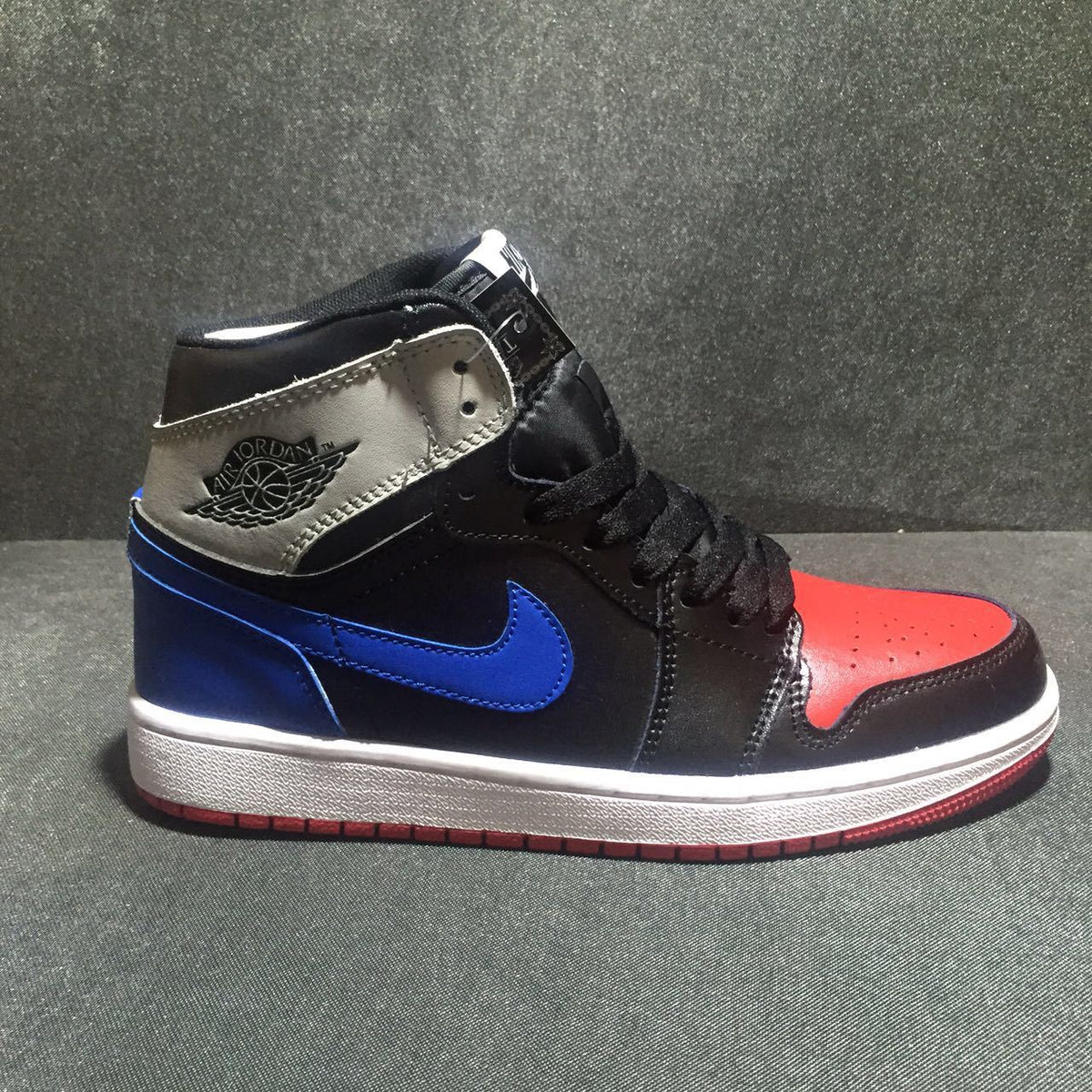 Jordan 1 High Three-Color Sneaker in Black, Blue and Red