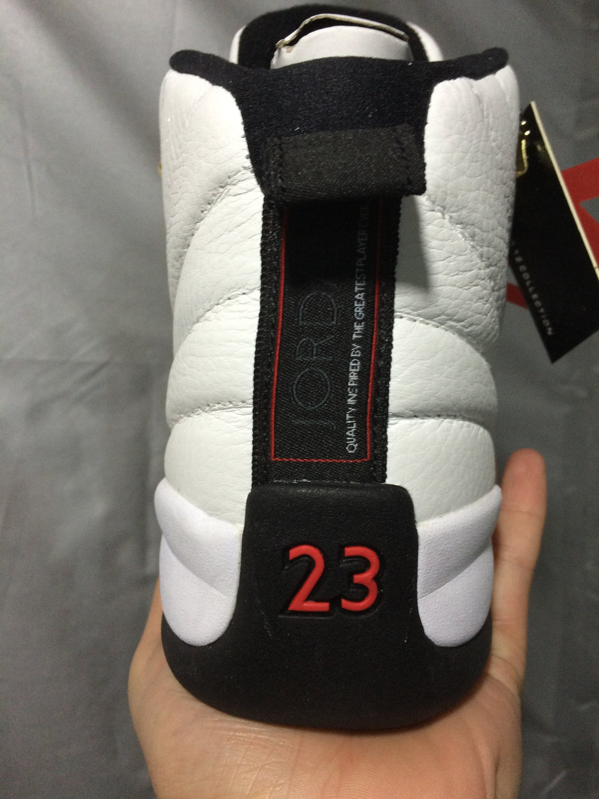 Jordan Air Jordan 12 Retro White and Black High-Top Sneakers