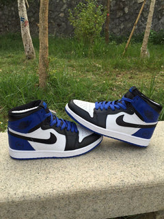 Jordan 1 High Sneakers in Black, White and Royal Blue