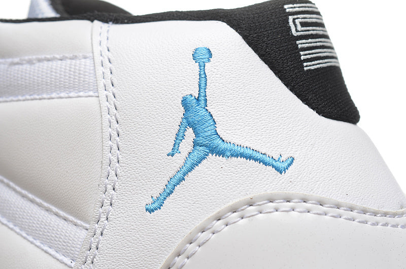 Jordan Air Jordan 11 Retro High-Top Sneakers in White and Blue