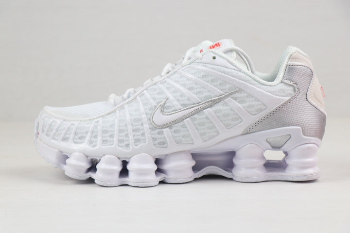 Nike Shox TL Sneakers in Black and Gold