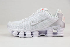 Nike Shox TL Sneakers in Black and Gold