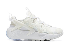 Nike Air Huarache Run Sneakers in White and Pale Blue