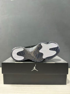 Comme des Garçons × Jordan Air Jordan 11 Black Sneakers