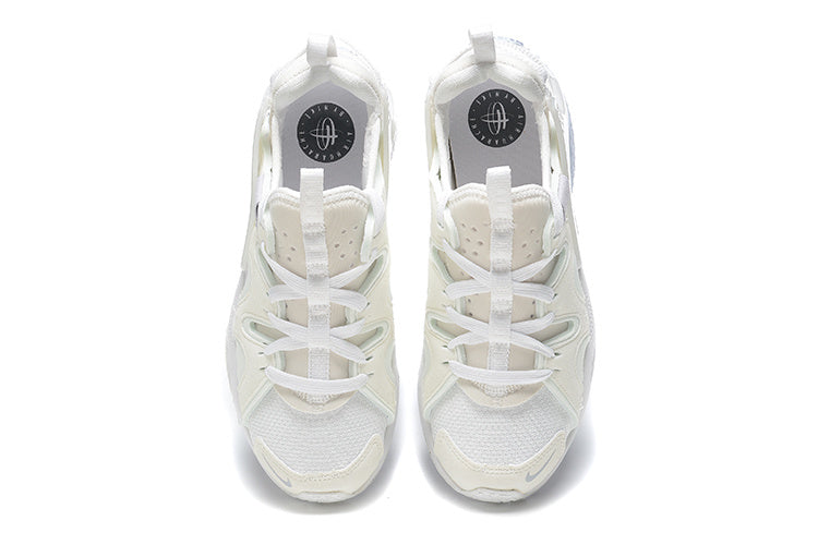 Nike Air Huarache Run Sneakers in White and Pale Blue