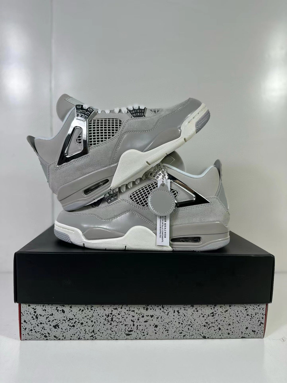 Jordan Air Jordan 4 Light Iron Ore Frozen Moments Sneakers