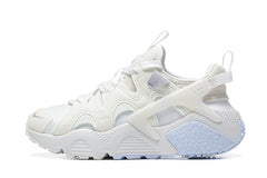 Nike Air Huarache Run Sneakers in White and Pale Blue