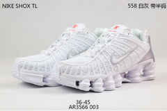 Nike Shox TL Sneakers in Black and Gold
