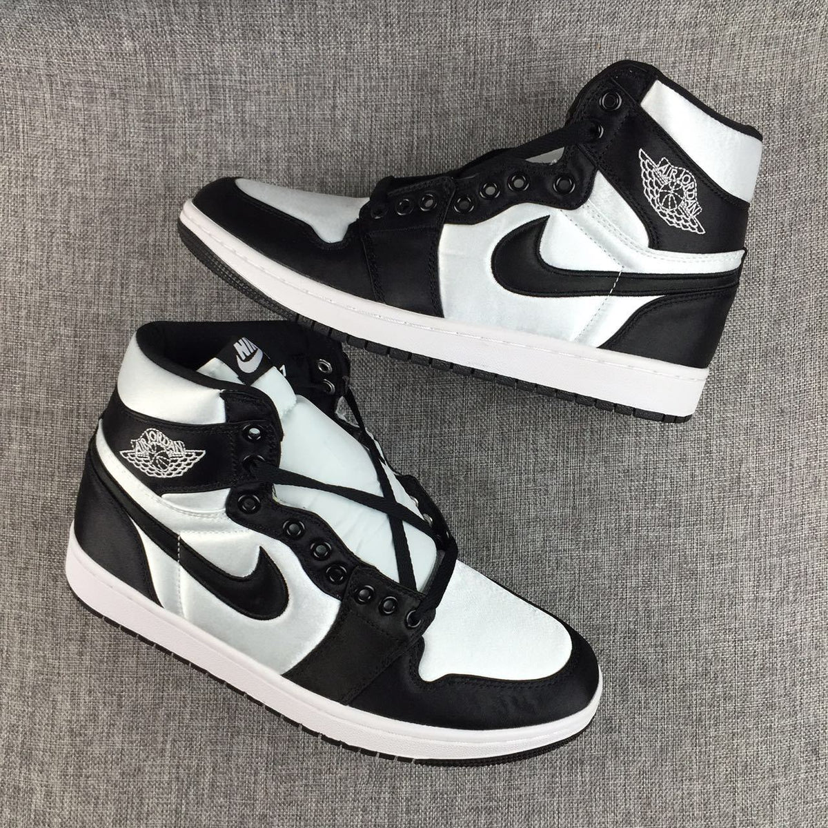 Air Jordan 1 High Black and White Satin-Style Sneakers