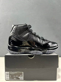 Comme des Garçons × Jordan Air Jordan 11 Black Sneakers